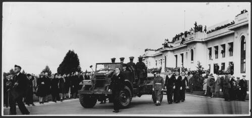 The coffin of Prime Minister John Curtin leaving Parliament House, Canberra, on a gun carriage, 6 July 1945 [picture]
