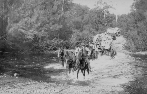 [Horse teams carting goods from the ship at Nellingen to Braidwood, crossing Currowan Creek, [1902?]] [picture]