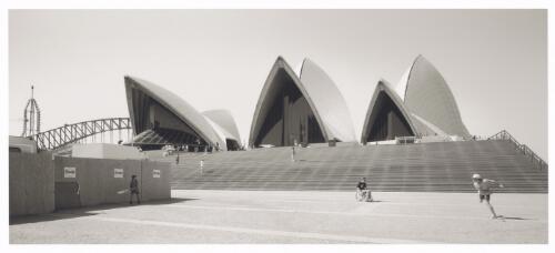 Boys playing cricket on the forecourt of the Sydney Opera House, New South Wales [picture] / David Kay