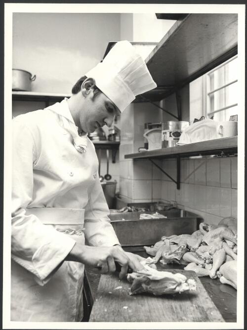 Barry Dignam, apprentice of the year for Victoria, 1975, prepares chickens in the kitchen of  Le Chateau Restaurant in France [picture] / Australian Information Service photo by John McKinnon