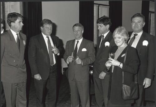 Dr. Neal Blewett and John Elliott [2nd left] at a Committee for Melbourne meeting 25/7/1991 [picture]  / Australian Foreign Affairs and Trade Department photograph by John McKinnon