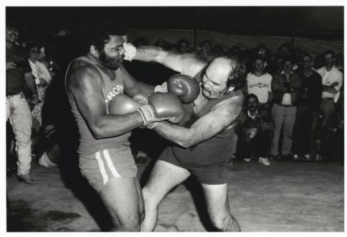 Brophy's Boxing Troupe, two men engaged in a boxing match, Birdsville, Queensland, 1988 [picture] / Charles J. Page