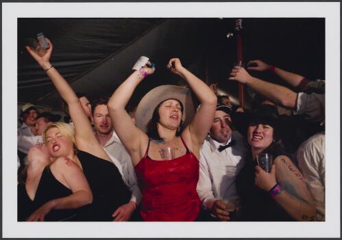 Bachelor and spinster's ball, dancing with glasses. Finley, New South Wales, 20 May, 2006 [picture] / Michael Coyne