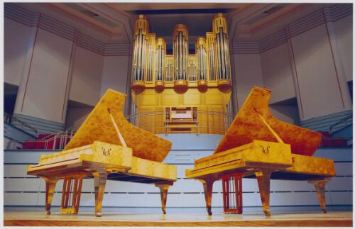 Huon pine concert grand pianos made by Stuart and Sons on stage at Newcastle University, New South Wales, 1998 [picture] / Bridget Elliot