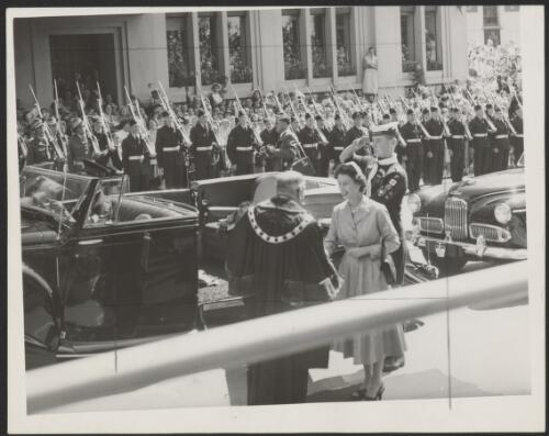 The Lord Mayor of Hobart, Sir Richard Harris, receives the Queen after she leaves her car in front of Hobart Town Hall, Tasmania, 1954 [picture]