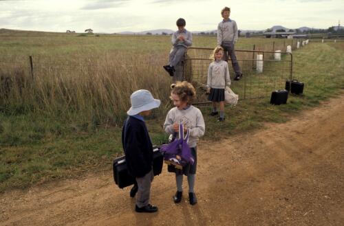The Martin children waiting for the school bus, Tarlee, Mullaley, New South Wales, 1990 [picture] / Philip Quirk