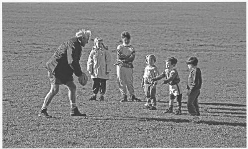 Bill Bramley, retired Magpies rugby union player and local identity, coaching junior players, Berry, New South Wales, 1995 [picture] / Jeff Carter