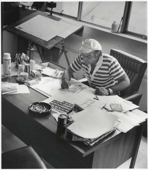 Portrait of cartoonist, Larry Pickering, at work in his studio, Surry Hills, New South Wales, November 1980 [picture] / Raymond de Berquelle