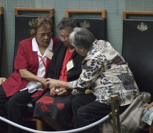 Members of the Stolen Generations, Netta Cahill, Lorna Cubillo, Valerie Day comfort each other after the reading of the Apology, Parliament House, Canberra, 13 February 2008 [picture] / Juno Gemes