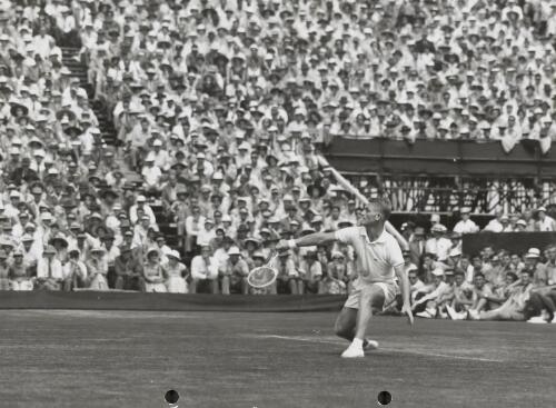 Lew Hoad playing tennis at White City courts, Sydney, 1956 [picture]