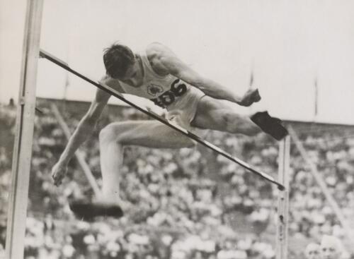 Athlete John Winter winning the high jump event at the London Olympic Games, August 1948 [picture]