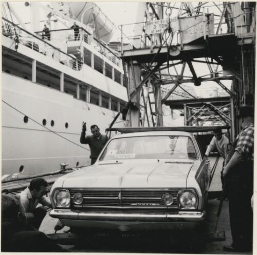 Holden car is loaded for export at Melbourne dockside, June 1967 [picture]