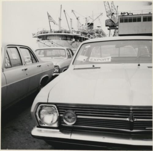 Holden cars await export at Melbourne dockside, June 1967 [picture]