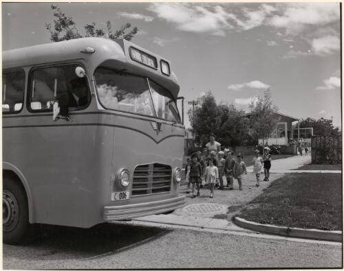 Canberra kindergarten children being escorted to bus for home, 1957 [picture]