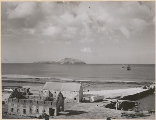 Phillip Island in the background and Kingston jetty, the first Government House and a structure of the convict days [picture]
