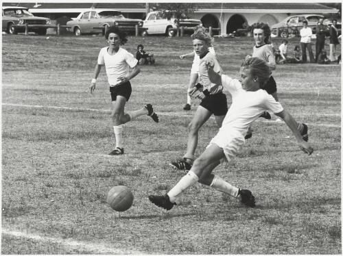 Boys playing a game of soccer, ca. 1970 [picture]