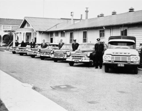 Police officers and vehicles outside of Canberra Police Station, Canberra,  ca. 1950s [picture]