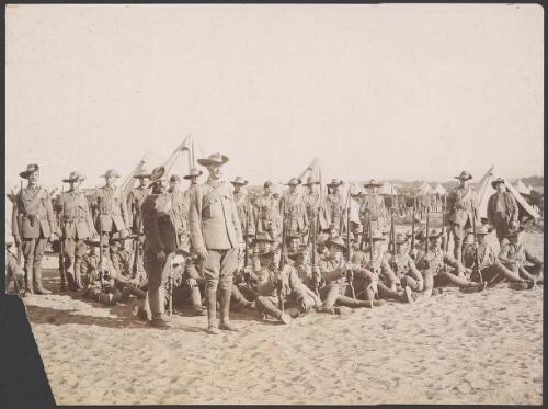 Australian soldiers in full uniform with rifles at a camp, South Africa?, ca. 1900 [picture]