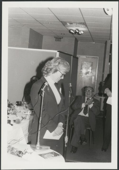 Portrait of Blanche D'Alpuget with George Hawkes seated in the background, 1981 [picture] / H. de Berg