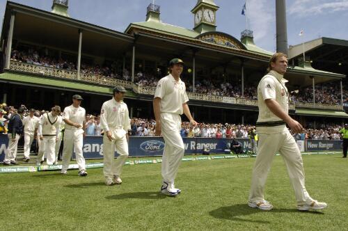 Australian cricketer Shane Warne leads team players Glenn McGrath, captain Ricky Ponting and Justin Langer onto the Sydney Cricket Ground during the Fifth Test of the Ashes Series, 2 January 2007 [picture] / Steve Holland