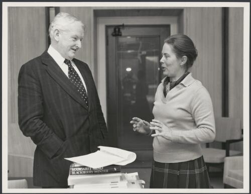 Portrait of Gay Davidson, first woman bureau chief in the Federal Parliamentary Press Gallery, interviewing Frank Crean in his office, Parliament House, Canberra, 1975 [picture] / Australian Information Service photograph by Ian Mitchell