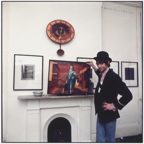 Portrait of artist Martin Sharp with one of his Artoons at the Yellow House, Macleay Street, Kings Cross, New South Wales, 1971 [picture] / Greg Weight