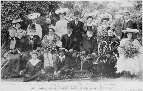 John Darling, centre, with family and guests at the wedding between Frederick William Young, standing, right, and Florence Darling, seated, right, Adelaide, 1904 [picture] / Photos by W.S. Smith