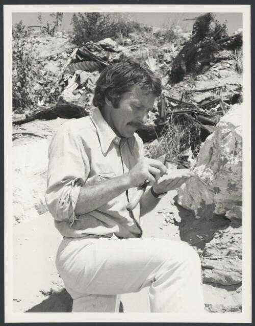 Charles Dortch at work in the rubbish tip where he found Aboriginal artifacts, Mosman Park, Western Australia, 1976 [picture] / Australian Information Service photograph by Mike Brown