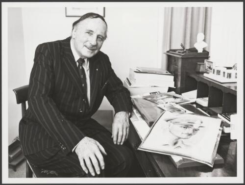 Portrait of Sir Edward Dunlop in his office, with a friend's sketch on his desk, 1986 [picture] / Promotion Australia photograph by John McKinnon
