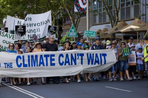 Participants carry a banner reading, Climate can't wait, during the Walk against warming, Sydney, 12 December, 2009 [picture] / Wendy McDougall