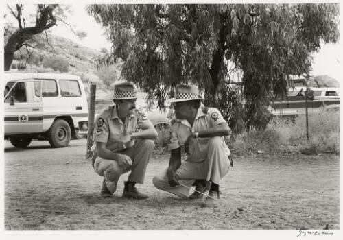 Police officer with an Aboriginal police officer, Ernabella, South Australia, 1987 [picture] / Joyce Evans