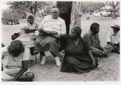 Four Aboriginal women and two Aboriginal men gathered at a meeting, Ernabella, South Australia, 1987 [picture] / Joyce Evans