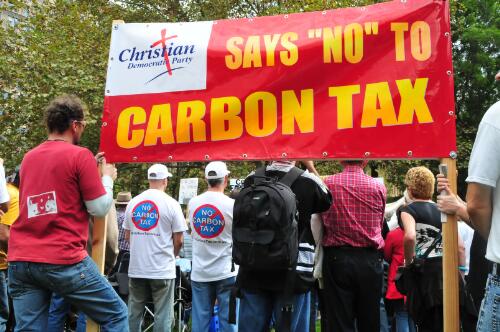 Protesters from the Christian Democratic Party holding banners during the anti-carbon tax rally at Hyde Park, Sydney, 2 April 2011 / John Immig