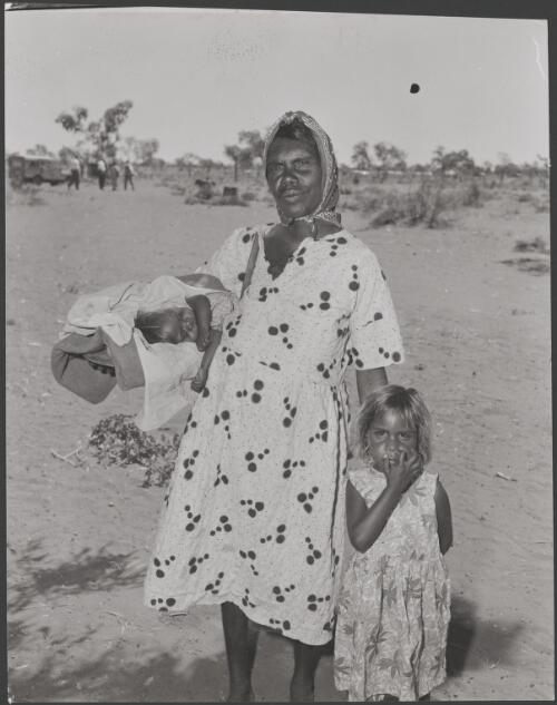 Aboriginal woman with her child and infant at Warrabri Settlement, Northern Territory, ca. 1958 [picture] / Australian News and Information Bureau photograph