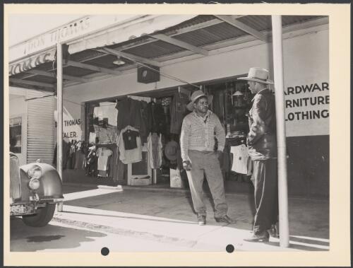 An Aboriginal man outside of Don Thomas' store, Alice Springs, Northern Territory, ca. 1960 [picture] / Neil Murray