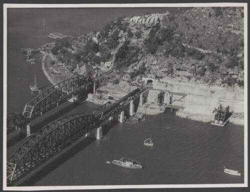 Opening of the new Hawkesbury River Bridge, with the tug 'Kiola' in the foreground, New South Wales, 1 July, 1946 [picture] / Photograph by Flight Lieutenant T.J. Callen