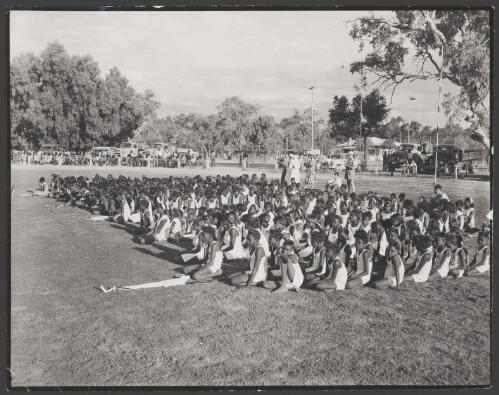 Large group of Aboriginal students at a sports meeting, Alice Springs, Northern Territory, 1958 [picture] / W. Pedersen
