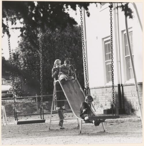Children playing in the grounds of the Hotel Acton, Canberra, September 1970 [picture] / photograph by Norman Plant