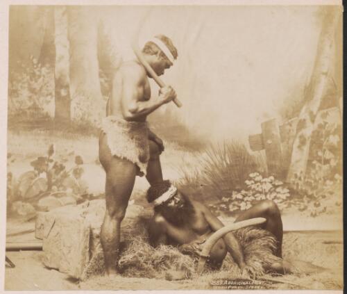 Two Aboriginal men, one holding a club and the other a boomerang, New South Wales? / Kerry & Co. Photo