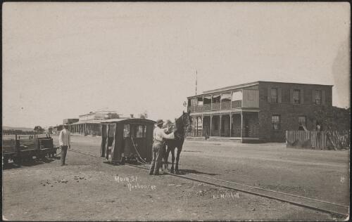 Horse drawn passenger tram on Main Street in Roebourne, Western Australia, approximately 1910 / Ernest Lund Mitchell