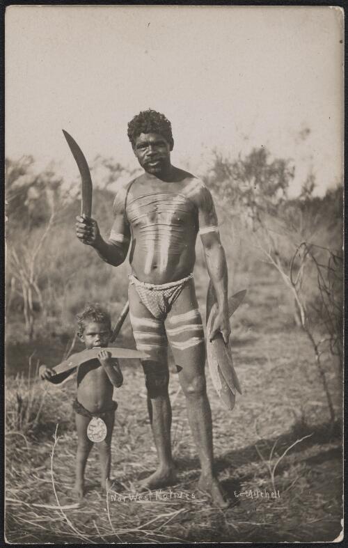 Aboriginal man and child with boomerangs, Western Australia, approximately 1910 / Ernest Lund Mitchell