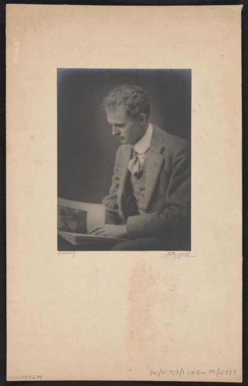 Norman C. Deck with a book, probably 1908, 1 / Harold Cazneaux