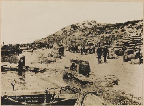 Stock-piled supplies and dug-outs on Anzac Beach, Gallipoli, probably 1915 / D.A. Markwell