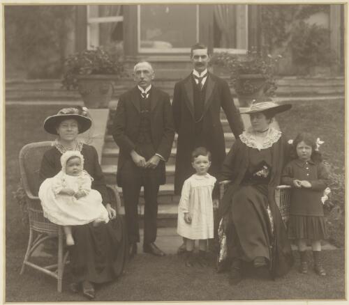 W.M. Hughes, his wife Mary with baby Helen and Neville Chamberlain and his family in Birmingham, England in May 1916 [picture]