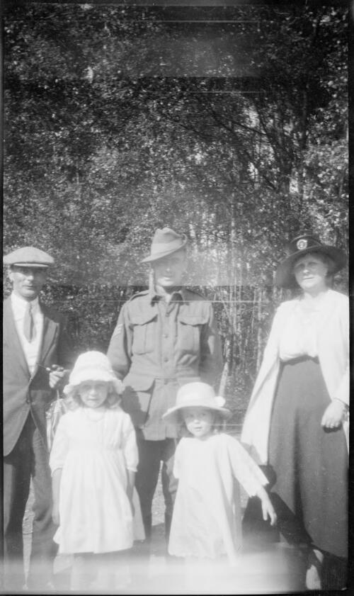 Two men, one in Australian Army uniform [son of W.M. Hughes?], Mrs. Hughes [?] and two girls [picture]