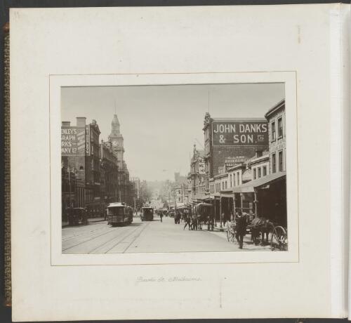 John Drake & Sons, other buildings and trams along Bourke Street, Melbourne, ca. 1900 [picture] / Nicholas Caire