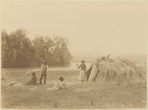 Aboriginal Australians outside a mia-mia [picture] / Kerry Photo