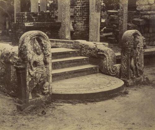 Entrance to a Buddhist Shrine, with the moon stone, two guard stones (Doratupala rupa) and a flight of steps decorated with ganas (dwarfs), Anuradhapura, Sri Lanka, ca. 1895 [picture]