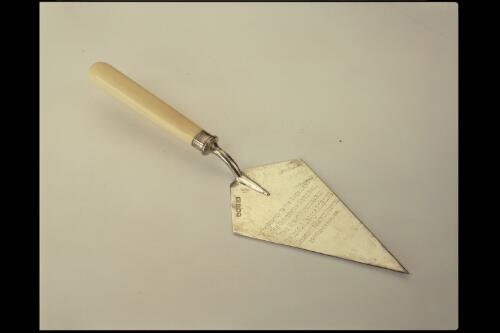 Trowel presented to Sir Isaac Isaacs as Governor-General on the occasion of laying foundation stone of Wangaratta District Hospital on 25th November, 1931 [realia] / G.H. Sheffield ; [retailer] Drummond W. & Co
