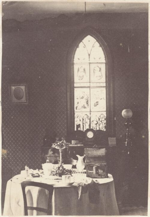 Dining room with a gothic stained-glass window ca. 1870 [picture] / J. Chester Jervis